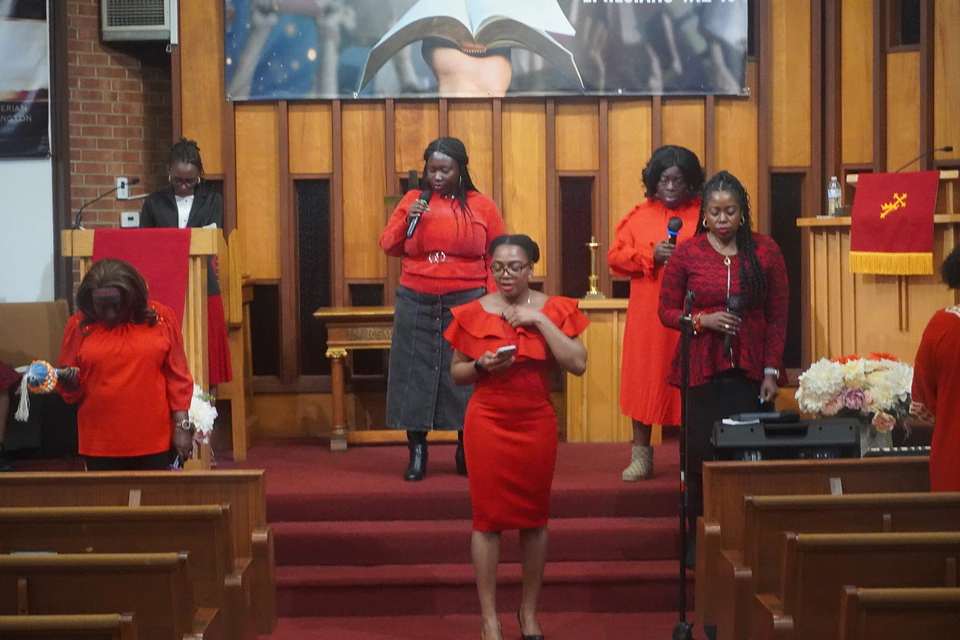 The worship singers leading the congregation in song