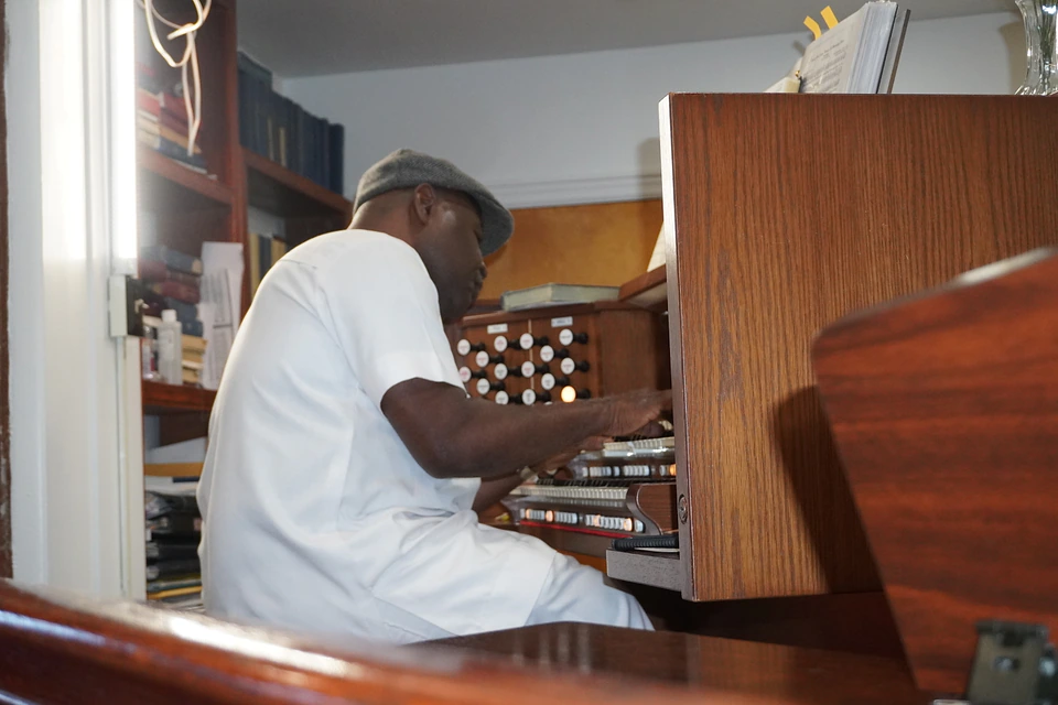 An organist playing during worship